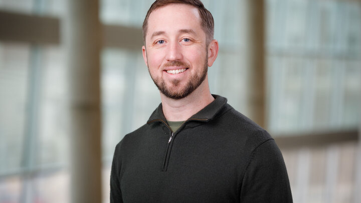 A headshot photo of Dr. Derrick Samuelson